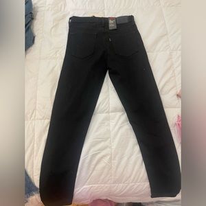 Size 27 high rise super skinny black Levi jeans